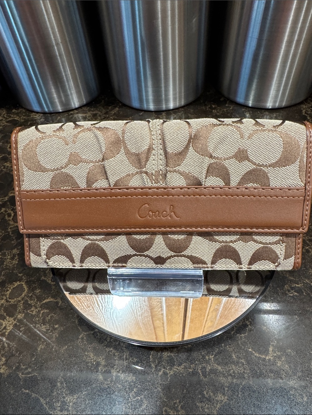 Coach Tan Signature “C” Canvas trifold Wallet with Brown Leather Trim embossed